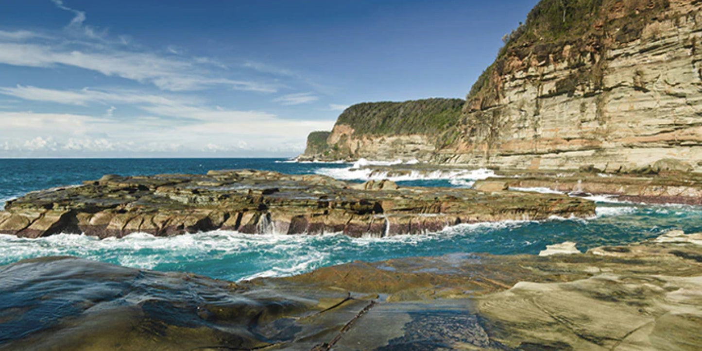 Surf Pounding Rocks